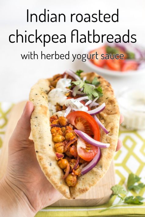 Indian roasted chickpea flatbreads - such an easy vegetarian lunch or dinner! Spiced roasted chickpeas with veggies and a herby yogurt sauce, all served up on a big naan bread! So much flavour. #indianflatbread #roastedchickpeas #indianchickpeas #vegetariandinner #healthyvegetarian Naan Wraps Vegetarian, Recipes Vegetarian Easy, Roasted Chickpea, Easy Vegetarian Lunch, Vegetarian Lunch, India Food, Naan Bread, Yogurt Sauce, Single Serving