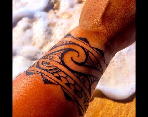 Polynesian arm band wave tattoo by Kaha Ki‘i Arts Wave Tattoo Wrist, Ta Moko Tattoo, Tato Maori, Wave Tattoo Design, Wave Tattoo, Maori Tattoo Designs, Samoan Tattoo, Ocean Tattoos, Hawaiian Tattoo