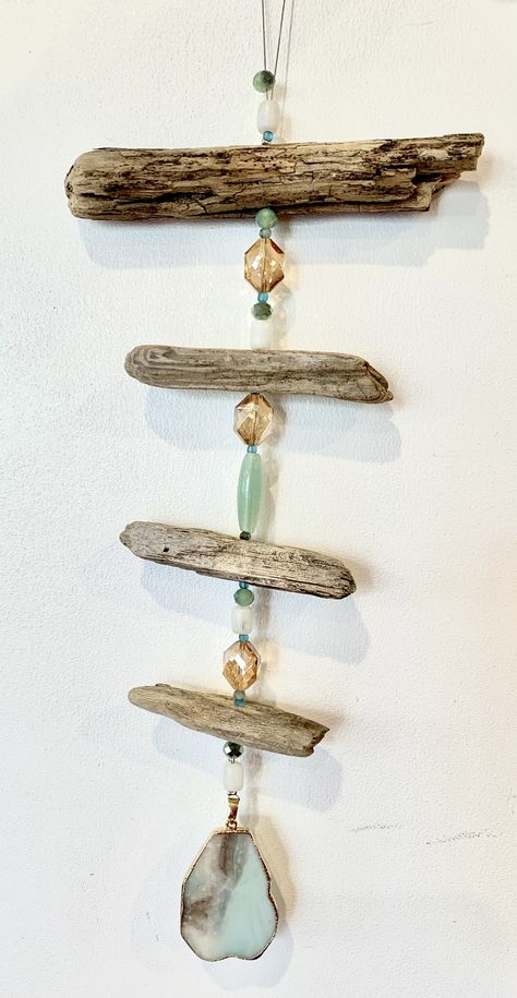 Driftwood Wall Hanging Diy, Diy Driftwood Windchimes, Driftwood And Crystals, Drift Wood Ideas Diy Projects Decor, Drift Wood Wind Chimes, Driftwood Wind Chime Ideas, Driftwood Crafts Wall Hangings, Driftwood Suncatchers, Driftwood Chimes