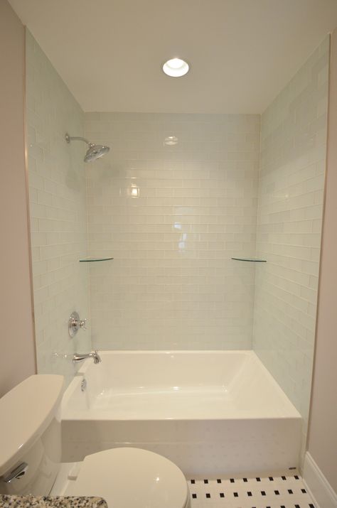 Oversized tub shower combo - with light blue tile, shower shelves, and large rainfall shower head Large Bath Shower Combo, Wide Tub Shower Combo, Large Shower Bath Combo, Large Bathroom With Shower And Tub, Shallow Bathtub Shower Combo, Large Bathtub Shower Combo, Large Tub Shower Combo, Light Bathroom Ideas, Dream Tub