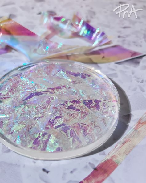 Transform your resin project into a showstopper that will dazzle your friends with the addition of iridescent cellophane! Iridescent Art Tutorial, Holographic Cellophane, Iridescent Cellophane, Iridescent Resin, Homemade Bar, Growing Crystals, Mosaic Jewelry, Resin Pour, Art Mosaic