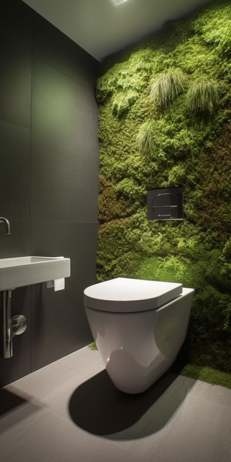 A refreshing and serene toilet design, featuring a striking and calming moss wall feature that infuses the space with organic texture and calming greenery. This pin showcases the perfect combination of nature and relaxation, creating a unique and inspiring feature that transforms the toilet into a peaceful and rejuvenating space. Wall Toilet Design, Classic Bathroom Ideas, Organic House Design, Cafe Interior Vintage, Mos Wand, Latest Bathroom Trends, Toilet Design Modern, Bathroom Wall Mural, Small Downstairs Toilet