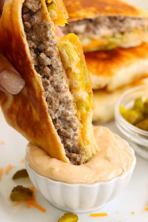 Big Mac Crunch Wrap - Kitchen Divas Hamburger Crunch Wrap, Big Mac Crunch Wrap, Big Mac Egg Rolls, Crunch Wrap Recipe, Saturday Night Dinner Ideas, Homemade Big Mac Sauce, Cheeseburger Wraps, Homemade Big Mac, Nacho Fries