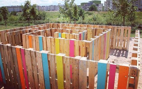 A great #DIY idea: A #pallet turned into a colorful maze for a children's playground. #yarddecor #palletfurniture Pallet Playground, Preschool Playground, Build A Dog House, Outdoor Play Spaces, Playground Ideas, Diy Playground, Play Ground, School Playground, Natural Playground