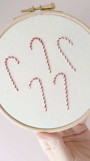 Jacqueline • Pick and Stitch on Instagram: "This stitch is perfect for candy canes! Learn this one and loads more with my #24DaysOfStitchmas kit! Link in bio to my Etsy shop. . . . #embroiderhappyhoops #britishstitchers #whippedbackstitch #learnembroidery #embroiderykit #embroiderykituk #sewingismytherapy #shophandmadeuk #embroiderypattern #heytheremaker #handstiched #embroiderypattern #handmadehour #makersofinstagram #makersgonnamake #lovewhatyoudo #handmadeisbest #embroiderydesigner #embroide Embroidery Candy Cane, Candy Cane Embroidery, Candy Canes Craft, Embroidered Ornaments, Candy Cane Crafts, Stocking Ideas, Holiday Embroidery, Hand Stitch, Hand Embroidery Projects