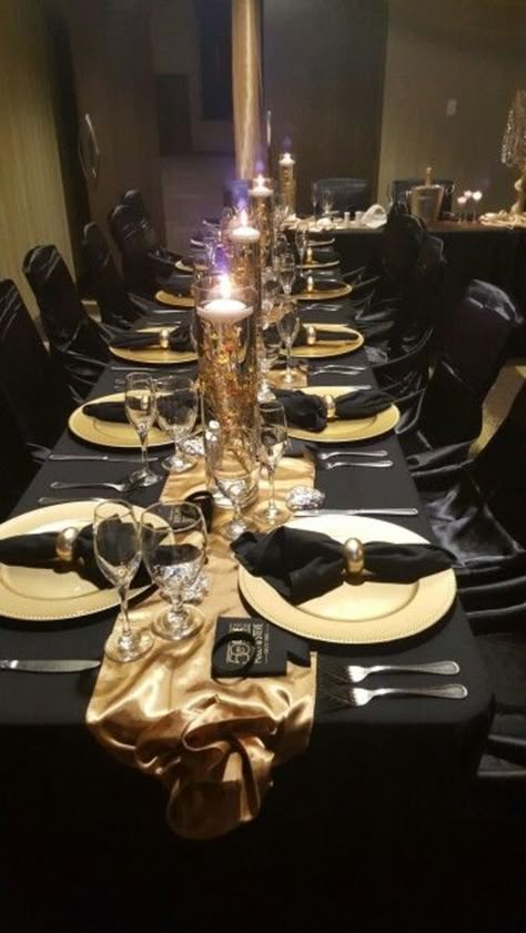 50+ Elegantly Stylish New Years Eve Table Setting Ideas | HubPages Black White And Gold Formal Party, Gold And Black Dinner Table Decor, Black And Gold Gala Dinner Decor, Black And Gold 50th Anniversary Party, Black And Gold Formal Party Decorations, Black And Gold Dinner Party Decor, Black And Gold Banquet Decorations, Black Gold Dinner Party, Black And Gold Elegant Party Decorations