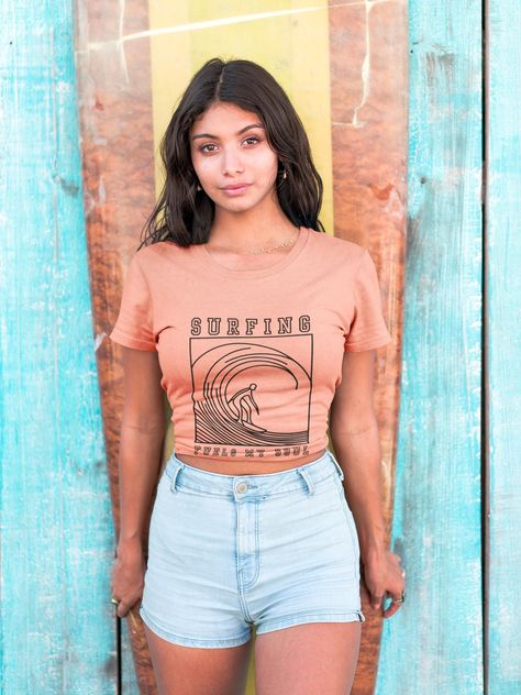 Inspire your inner ocean lover with this Surfing Fuels My Soul Unisex T-Shirt. Perfect for those who embrace the beach life, summer vibes, and chasing waves. Ideal for free spirits who love the sea, this tee is a must-have for anyone who enjoys the ocean. Product features - Made with 100% lightweight cotton for easy layering and breathability - Retail fit suitable for casual and semi-formal settings - Manufactured by Bella+Canvas in a humane, sustainable way - Sleeve and neck label printing techniques ensure vibrant colors and detailed designs - Tear-away label minimizes skin irritations Care instructions - Machine wash: cold (max 30C or 90F) - Non-chlorine: bleach as needed - Tumble dry: low heat - Iron, steam or dry: medium heat - Do not dryclean Surf T Shirts, Label Printing, Surf Tee, Ocean Lover, Neck Label, Free Spirit, Beach Life, Printing Techniques, Semi Formal