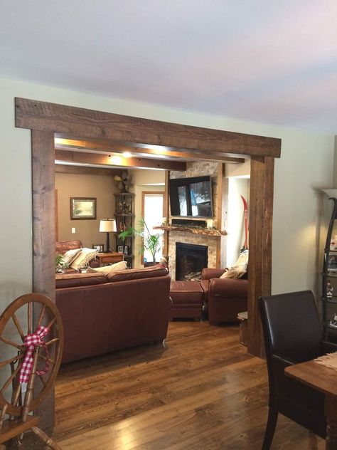 Indoor Archway Decor Living Rooms, Wooden Beam Archway, Wood Beam Room Seperation, Case Openings Between Rooms, Framed Opening Between Rooms, Archway Between Kitchen And Living Room, Wood Cased Opening, Beam Between Kitchen And Living Room, Cased Openings Between Rooms