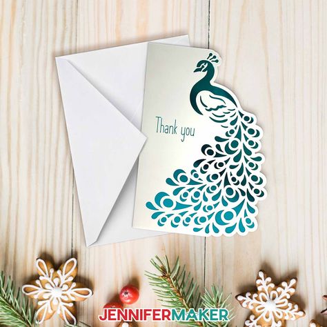 Learn how to design side edge cards with Jennifer Maker's tutorial! A beautiful card with a peacock and decorative edges sit on a holiday table. Peacock Cards Handmade, Cards Made With Cricut, Origami Butterfly Tutorial, Jennifer Maker, Circuit Crafts, Snowflake Cutouts, Butterfly Tutorial, Fine Point Pens, Origami Butterfly