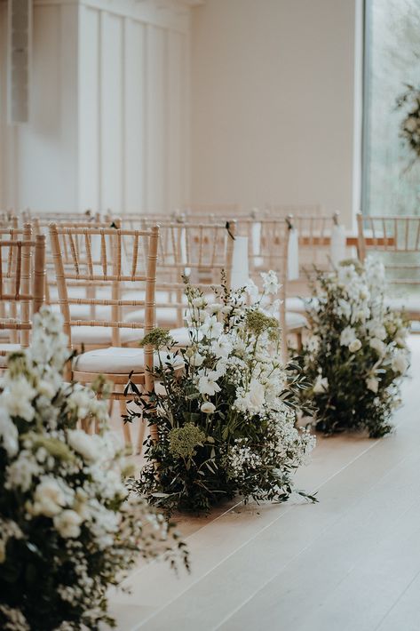 Autumn Winter Wedding Ceremony Inspiration | Elegant and classic floral arrangements for an inside ceremony at Millbridge Court | An abundance of foliage and delicate white flowers, pedestal arrangements and aisle meadows | Captured by Kit Myers Photography White Meadow Flowers, Aisle Meadows Wedding, Aisle Meadows, Pedestal Arrangements, Dolomites Wedding, Tortworth Court, Millbridge Court, Iscoyd Park, Winter Wedding Ceremony