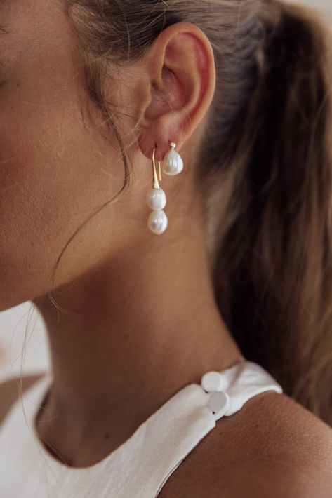 A contemporary approach to a traditional accessory, the Lilou Earrings are crafted from the finest freshwater pearls, secured with 14ct gold vermeil or sterling silver componentry. Naturally imperfect, freshwater pearls are unique in their texture and are a timeless accessory for the alter and beyond. GRACE take on the traditional heirloom. Grace Love, Back Wedding Dress, Grace Loves Lace, Backless Wedding, Backless Wedding Dress, Earrings Drop, Timeless Accessories, Online Earrings, Style Earrings