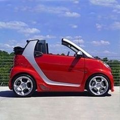 Adding wide body kits to your Smart Car can really give it that sporty look. Find body add-ons or custom kits to boost the cool factor of your Smart Fortwo Smart Car Body Kits, Mercedes Smart, Fantasy Vehicles, Ford Convertible, Car Body Kit, Smart Cars, Benz Smart, Solar Panels Roof, Tiny Cars