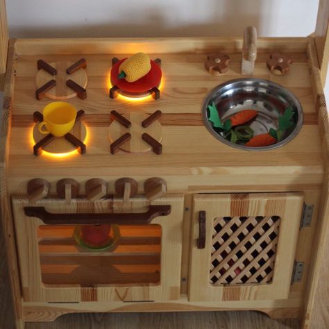 Look at this amazing kitchen set!Each burner, and the oven, is individually lit.Kids love playing pretend games.This oven will make a very special Christmas gift for someone who dreams of becoming a chief when they grow-up.Invest into your child’s future. Wooden Play Oven, Kitchen Pretend Play, Kids Wooden Kitchen, Wooden Kitchen Toys Kids, Wooden Kitchen Set, Wooden Play Kitchen Kidkraft, Wooden Play Refrigerator, Wooden Toy Kitchen, Diy Kids Kitchen