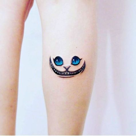 220+ Cheshire Cat Tattoo Designs (2021) Simple Small Meaningful Ideas Cat Face Tattoo, Cheshire Cat Face, Caterpillar Tattoo, Keyhole Tattoo, Cat Face Tattoos, White Rabbit Tattoo, Cheshire Cat Tattoo, Cat Portrait Tattoos, Dali Tattoo