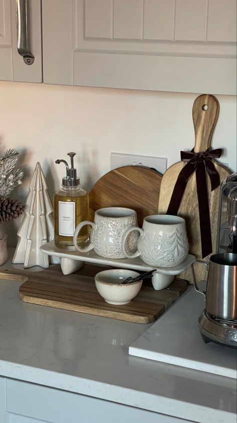 Coffee station, christmas kitchen decor, christmas coffee station, hot chocolate station, neutral Christmas decor, christmas mugs Christmas Coffee Station Ideas, Christmas Coffee Corner, Kitchen Hot Cocoa Bar, Hot Chocolate Station Christmas, Hot Chocolate Station Ideas Countertop, Coffee Station Christmas Decor, Christmas Hot Chocolate Station Kitchen, Christmas Hot Chocolate Bar Aesthetic, Christmas Coffee Bar Ideas