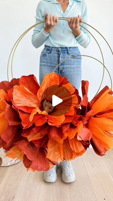 NEUE BLVD on Instagram: "It’s time for orange to shine 🍊  #giantflowers #giantflower #giantflowersdecor #paperflower #paperflowers #paperflowerbackdrop #paperflowerwall #flowerwreath #wreath #christmaswreath #walldecor #homedecoration #home #artofinstagram #instadaily #ootd #floweroftheday #christmastree #christmasdecorations #modernchristmas #fyp #explorepage #trendingaudio #tutorial #influencer" Orange Backdrop Ideas, Giant Flower Backdrop, Crochet Bracelet Tutorial, Giant Flowers Diy, Giant Paper Flowers Diy, Diy Cake Topper Birthday, Easy Paper Flowers, Paper Flower Backdrop, Paper Flower Wall