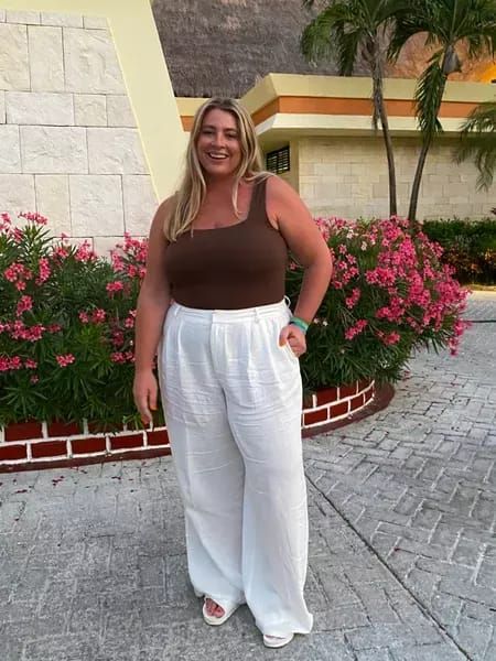 Plus size beach resort outfit 🏖 the white linen pants from eloquii run true to size, or size down if in between sizes. You can save 50% off on the wide leg linen pants right now, too! The brown bodysuit from old navy also runs true to size and I would size down if in between sizes. I paired the outfit with my birks for the sake of packing light, but the outfit would look great with a heel or nicer sandal too! #LTKsalealert #LTKcurves #LTKunder100 Linen Pants Outfit Plus Size, Plus Size Linen Pants Outfit, Wide Leg Linen Pants Outfit, White Pants Outfit Summer, Linen Pants Outfit Summer, Vacation Plus Size, White Linen Pants Outfit, Wide Linen Pants, Brown Linen Pants