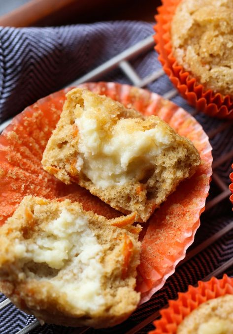 Inside Out Carrot Cake Muffins are soft, sweet carrot muffins, spiced with cinnamon, topped with crunchy sugar, and filled with delicious cream cheese frosting that peeks out the top when they're baked. #cookiesandcups #carrotcakemuffins #carrotmuffins #easter #muffins Easter Muffins, Cinnamon Glaze Recipe, Cream Cheese Filled Cupcakes, Vegan Carrot Cake Muffins, Carrot Cake Muffin Recipe, Cinnamon Carrots, Healthy Carrot Cake Muffins, Healthy Carrot Cake, Muffin Flavors