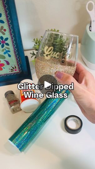 17K views · 4.1K reactions | How to make a glitter dipped wine glass with peekaboo shamrocks ☘️

These glasses are so fun and festive! For the peekaboo shamrocks, be sure to choose a vinyl that has color on both sides. I used @cricut holographic vinyl. 

You’ll also need extra fine glitter, mod podge, and electric tape. I like electric tape because it has a little stretch, but you can also use painter’s tape! 

#glitteredwineglass #stpatricksdaycrafts #cricutcrafts #modpodge #glitterdipped #cricutideas #crafttutorials | Lisa I Cricut Tutorials & Crafts | Babe Rainbow · Peace Blossom Boogy Babe Rainbow, Glitter Wine Glasses Diy, Wine Glass Vinyl, Glitter Wine Glasses, Rainbow Peace, Diy Wine Glasses, Mermaid Glitter, Spring Decorating, St Patrick's Day Crafts