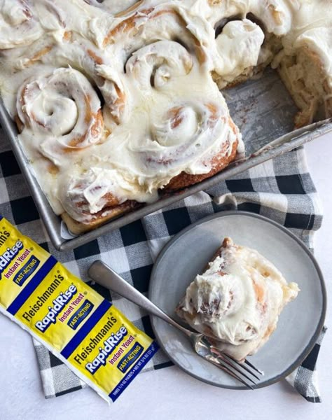 The OMG Easiest and BEST Cinnamon Rolls Recipe EVER! These gooey cinnamon rolls are made with instant yeast making the process QUICK! No more hours of rise-time! The dough is fluffy and light, and the filing is buttery, cinnamon sugar goodness....all topped with a heavy helping of buttercream that melts in your mouth! #cookiesandcups #cinnamonrolls #rapidriseyeast #yeastbaking #fleischmanns #sponsored #breakfast Cinnamon Buns Quick Rise Yeast, Rapid Rise Cinnamon Rolls Recipe, Fleishman Cinnamon Rolls, Instant Yeast Desserts, Rapid Yeast Cinnamon Rolls, The Best Homemade Cinnamon Rolls, Recipes With Rapid Rise Yeast, Fast Rising Yeast Recipes, Cinnamon Rolls Homemade Fast Rising Yeast