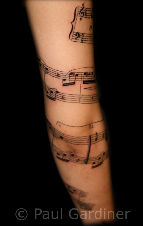 Wrap Around Music Tattoo, Sleeve Tattoos For Guys Music, Sheet Music Tattoo Sleeve, Music Score Tattoo, Music Sheet Tattoo, Music Sleeve Tattoo, Sheet Music Tattoo, Small Music Tattoos, Image Tattoo