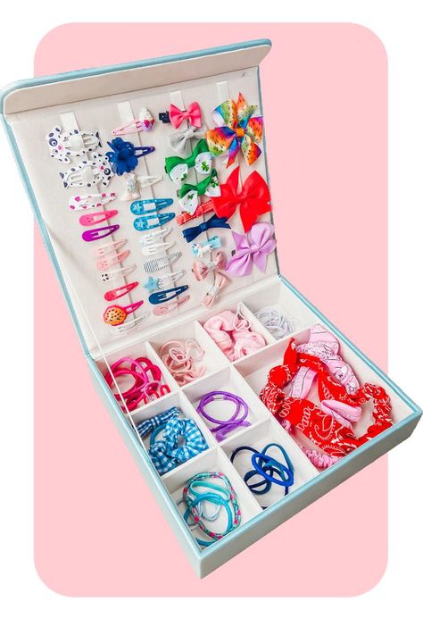 At last, the solution to those tins and puches full of hair bobbles, head bands, hair clips....the tangled mess to be sorted through every day! The gorgeous hair accessories that never get worn as they get forgotten about! Now, store them all in this stylish storage box, and see at a glance what you have. No more tangled and mismatched hair accessories. A truly unique design! Follow us for updates! Diy Hair Accessories Organizer, Hair Accessory Storage, Cheer Bows Diy, Stylish Storage Boxes, Hair Clip Organizer, Hair Product Organization, Hair Acessories, Hair Accessories Storage, Accessory Storage