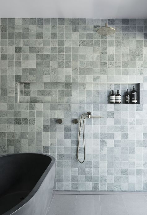 The master bath is beautifully dressed with Ming Green tiles from Bisanna to evoke imagery of the nearby forest. The cast concrete freestanding bath is from Concrete Nation, and the taps are from the Brodware Contemporary Halo Collection. Ming Green Tile, Beautiful Bathroom Ideas, Concrete Bathtub, Brick Courtyard, Concrete Bath, Porcelain Tile Bathroom, Creative Tile, Recycled Brick, Floor Tile Design