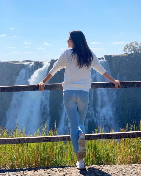 Image may contain: one or more people, people standing, outdoor, nature and water Pose At Airport, Travel Poses, Korean Trends, Kriti Senon, Trip Pictures, Candid Pics, Travel Pose, Sister Poses, Belly Shirts