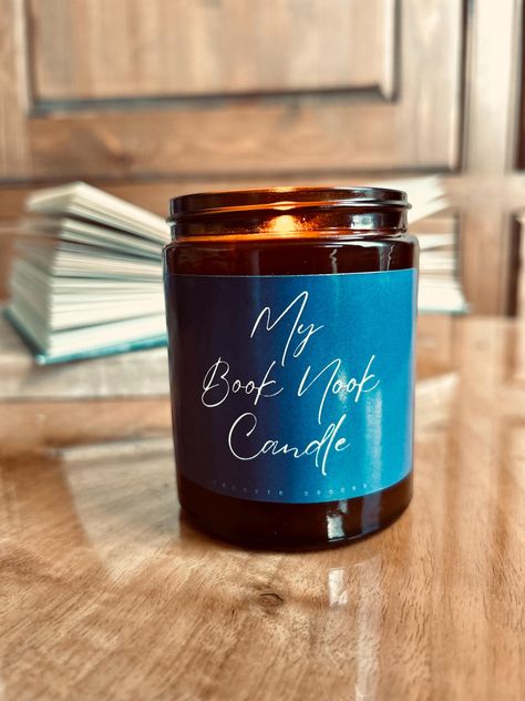 Natural Soy Wax | Book Candle | 30 hours Burn Time approx | Vegan | Hand Poured | Gifts For Book Lovers | Reading Gifts The perfect addition for book lovers and their book nooks. Cosy up with your favourite book and ignite your senses with the warm and inviting glow of our Soy Wax Hand-Poured Amber Jar Candles Each candle is detailed with a gloss label with the words 'My Book Nook Candle' and a black lid, with a number or fragrances to choose from Scent Descriptions *Vintage Bookshop* A timeless Vintage Bookshop, Book Gift Ideas, Amber Jar Candle, Pink Icing, Gifts For Book Lovers, Amber Jars, Reading Gifts, Book Gift, Jar Candles