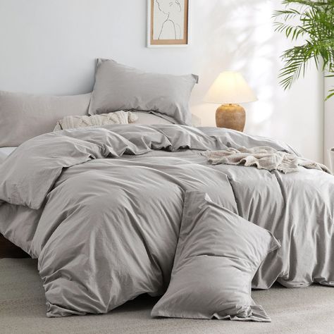 PRICES MAY VARY. Extra Cozy: The 100% cotton outer cover on this comforter set provides exceptional breathability and moisture-wicking properties, ensuring maximum coziness night after night. Ultra Soft: This comforter is prewashed in manufacturing, and filled with extra-fine polyester microfiber to achieve an exquisite softness that's gentle on the skin, delivering all-year-round comfort. Natural Wrinkle: This comforter features a stylish, natural wrinkle that can effortlessly complement any in Comforter For Bed, Gray Comforter Bedroom, Grey Comforter Bedroom, Gray Comforter, Grey Bed Sheets, Full Comforter Sets, Fluffy Comforter, Grey Comforter, Grey Duvet