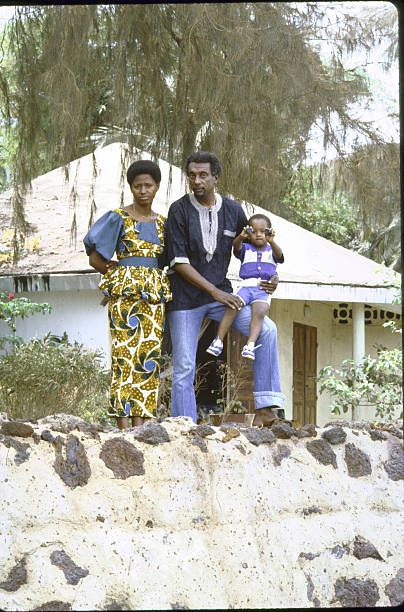 Stokely Carmichael [& Family];Boca Biro Ture;Marylatou Barry Black activist Stokely Carmichael, aka Kwame Ture, w. wife Marlyatou Barry & son Boca Biro in yard at home. (Photo by William F. Campbell Kwame Ture, Black Activist, Stokely Carmichael, African Diaspora, Art Prints For Sale, Historical Events, Home Photo, Prints For Sale, High Res