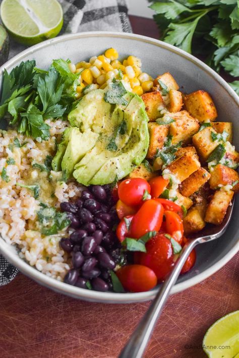 Crispy Tofu Burrito Bowl With Lime Dressing - AndiAnne Tofu Avocado Bowl, Mexican Tofu Bowl, Burrito Bowl Dressing, Tofu Burrito Recipe, Tofu Burrito Bowl, Tofu Burrito, Ways To Cook Tofu, Chipotle Tofu, Tofu Rice