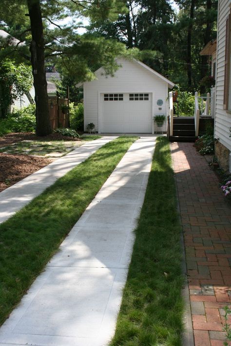 Love the simplicity of the ribbon driveway with cement. Also like something other than grass down the middle - Consider colorful annuals or a ground cover down the center. Ribbon Driveway, Cement Driveway, Grass Driveway, Permeable Paving, Dallas House, Permeable Pavers, Concrete Walkway, Brick Garden, Garden Fire Pit