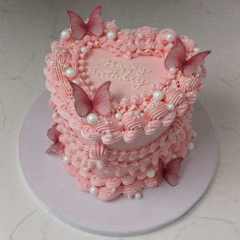 💗🦋 - Cake Details - Size: Mini 6” (two layers) Add-ons: Pearls (edible) + butterflies (edible) #custom #cakes #customcakesseattle #seattlecakes #seattle #emmacakes #emmacakesseattle #seattlebaker #seattlewedding #seattlebirthday Vintage Cake With Butterflies, 30th Heart Cake, Birthday Cakes With Butterflies, Pink Cake Ideas Birthday, Heart Cake With Butterflies, Pink Aesthetic Birthday Cake, Cute Mini Cakes Birthdays, Butterfly Heart Cake, Cute Pink Birthday Cake