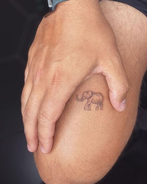 Mini Elephant Tattoo Mini Elephant Tattoo, Tattoo On The Thigh, Little Elephant Tattoos, Thumbprint Tattoo, Realistic Elephant Tattoo, Simple Elephant Tattoo, Elephant Tattoo Ideas, Baby Elephant Tattoo, Tiny Elephant Tattoo