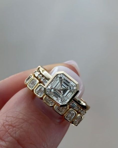 Blake Asaad on Instagram: "To bezel or not to bezel? That’s the question ✨  Discover the elegance and durability of a bezel-set engagement ring. This design not only enhances your gemstone’s brilliance but also provides sleek protection and timeless style. 💍  Choose from a full bezel, half bezel, or no bezel at all—the Asscher cut will dazzle no matter what. 💎 Share this with your bestie who loves Asscher cuts as much as we do! ✨  Your path to the perfect ring starts now  📮 Get in touch at hello@goodstoneinc.com  🌠 Explore our collection of exquisite rings  🌐 View our breathtaking pieces at www.goodstoneinc.com  #goodstone #engagementring #engagementrings #asschercut #asscher #asschercutdiamond #bezelset #bezelsetting #ringstacks" Silver Bezel Ring, Luxury Bezel Set Asscher Cut Sapphire Ring, Asscher Cut Engagement Ring Bezel Set, Asscher Cut Diamond Ring With Bezel Setting, Classic Asscher Cut Rings With Bezel Setting, Luxury Asscher Cut Bezel-set Jewelry, Asscher Cut Engagement Ring, Rose Cut Engagement Rings, Asscher Cut Engagement Rings