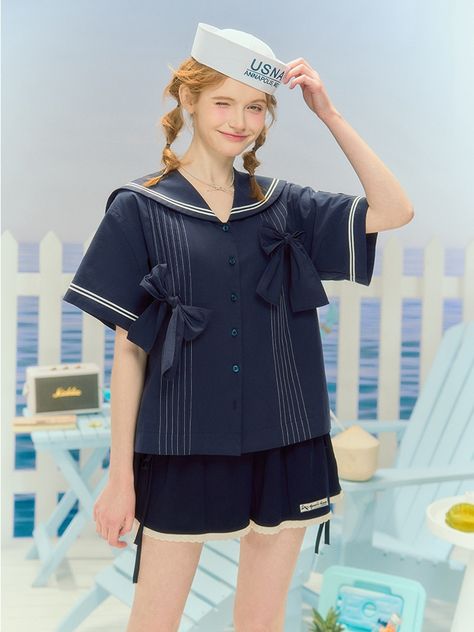 Get in touch with your inner playful and cute side with our charming dark blue short-sleeve shirt. This loose-fitting top features self-tie bowknots, sailor collar, and front button closure, adding an adorable touch to any outfit. Perfect for those who love the Lolita and kawaii fashion styles.  Please note that this product includes only the shirt.  Garment Size   	 		 			Size 			S 			M 			L 			XL 		 		 			Full Length 			60 			61 			62 			63 		 		 			Shoulders 			49 			51 			53 			55 		 		 			Bust 			102 			106 			110 			114 		 		 			Sleeve Length 			19 			19.5 			20 			20.5 Sailor Shirt Outfit, Sailor Outfit Aesthetic, Sailor Outfit Mens, Sailor Inspired Outfit, Sailor Outfit For Women, Sailor Collar Shirt, Sailor Collar Blouse, Fishing Fashion, Sailor Sweater