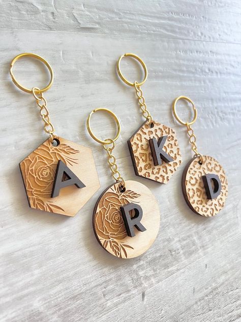 This unique wooden keychain features a floral design and is perfect for the boho-chic woman in your life. It's made from sustainable materials and makes a great gift for any.#laserkeychain #customkeychain #personalizedgift #keychainlove #keychainaddict Wood Engraved Keychain, Laser Keychain Ideas, Laser Engraving Projects To Sell, X Tool Projects, Easy Sellable Crafts, Popular Keychains, Wood Keychain Ideas, Wooden Keychain Ideas, Laser Keychain