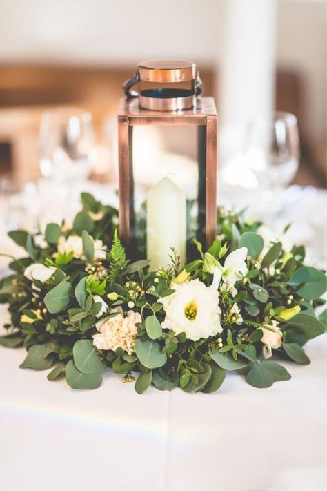 Using a wreath as a centerpiece.  Can use different foliage for texture and interest, and just a few focal flowers. Low Wedding Centerpieces, Bridal Car, Table Arrangements Wedding, Candle Wedding Centerpieces, Tafel Decor, Lantern Centerpieces, Flowers And Greenery, Copper Wedding, Wedding Lanterns