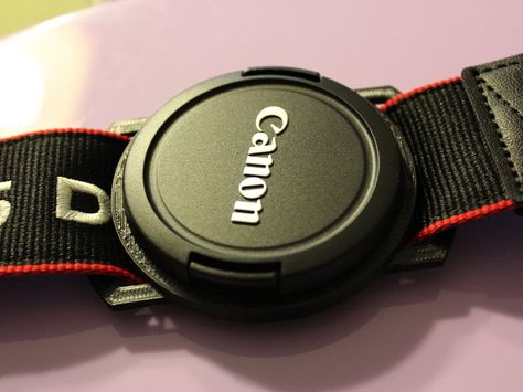 Camera Lens Cap Holder by kitlaan - Thingiverse Cannon Camera, Cap Holder, Printer Laser, Lens Caps, Camera Straps, Lens Cap, Camera Strap, Garmin Watch, Gopro