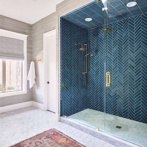 Bathrooms of Instagram on Instagram: “Deep blue tile laid in a herringbone pattern, marble trimmed wall niches, and anti-slip marble penny tile on the floor makes this shower a…” Master Bath Blue Tile Shower Ideas, Blue Shower Tile, Dark Blue Tile, Blue Bathroom Tile, Teal Bathroom, Shower Wall Tile, Bathroom Remodels, Bad Inspiration, Bathroom Redesign