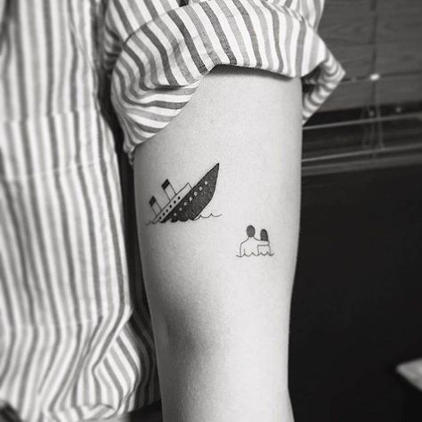 Titanic tattoo on the left bicep. Titanic Tattoo Ideas, Daschund Tattoo, Titanic Tattoo, Simple Tats, Tatoo Inspiration, Movie Tattoo, Clever Tattoos, Line Tattoos, Piercing Tattoo