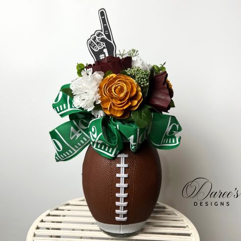 Description: ARE YOU READY FOR SOME FOOTBALL?? Get ready to host your next football party and cheer on your favorite team with our real football! This centerpiece has Sola wood flowers dyed to match your team’s colors! Or make custom Sola Wood Flower Football Centerpiece! Designs for every team; the perfect companion to all your tailgating parties. Contact us for a custom designed request!Product Details:· Dimensions: 13inch tall.· #CP-1006 All products are made to order. Production time is depe Football Centerpiece, Football Party, Wood Flowers, Football, Wood, Flowers, American Football