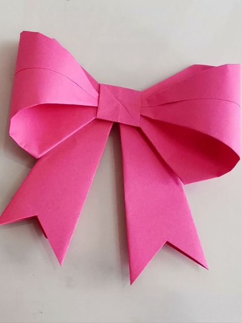 How to make an origami bow tie for gift Bow With Wrapping Paper, Origami Ribbon, Bow With Ribbon, Make Bows, How To Fold, Gift Ribbon, Square Paper, How To Make Bows, Ribbon Bows