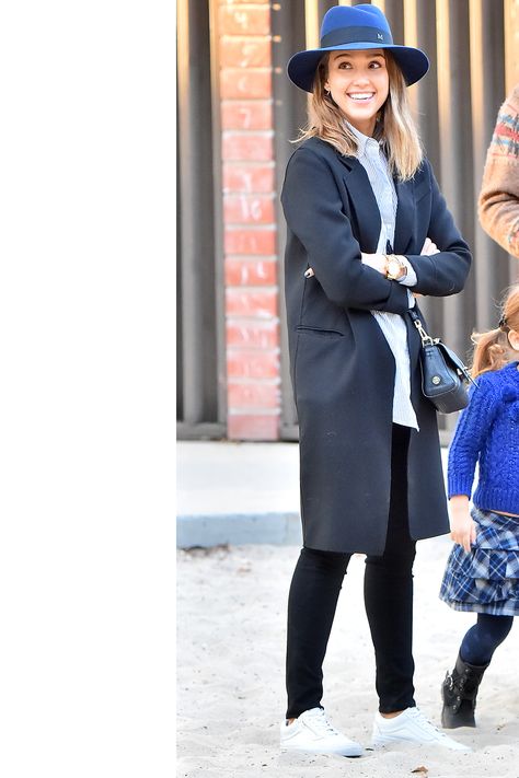 Black skinnies with a navy coat, white sneakers, and a blue topper. Maison Michel Hat Outfit, Blue Hat Outfit, Black Fedora Hat Outfit, Fedora Outfit, Jessica Alba Family, Fedora Hat Outfits, Navy Trench Coat, Black Fedora Hat, Black Fedora