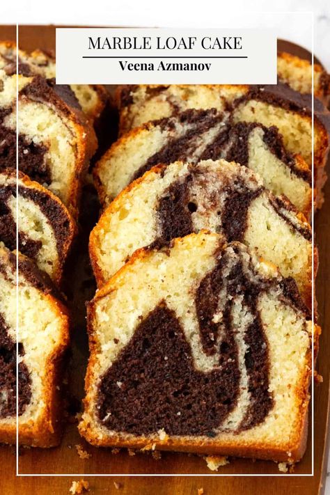 Marble loaf cake, for the uninitiated, is a delightful combination of rich chocolate and vanilla flavors swirled together in a beautiful marbled pattern. It's the best loaf cake out there for many reasons – it's moist, tender, and boasts a mesmerizing visual appeal that will have everyone reaching for a slice. Marble Loaf Cake Moist, Madiera Loaf Cake, Marble Cake Loaf, Marble Loaf Cake Recipes, Chocolate Marble Loaf Cake, Vanilla Loaf, Vanilla Loaf Cake, Marble Loaf Cake, Marble Loaf