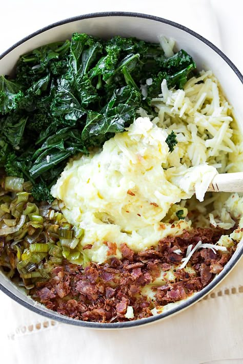 Cozy and creamy, this delicious Irish colcannon prepared with yellow potatoes, garlic-sauteed kale, bacon, caramelized leeks, and cheddar is a delectable alternative to traditional mashed potatoes with loads more flavor! #colcannon #colcannonrecipe #colcannonrecipeirish #colcannonpotatoes Colcannon Recipe Irish, Caramelized Leeks, Cheap Side Dishes, Irish Colcannon, Beautiful Meals, Colcannon Recipe, Ancestral Diet, Irish Cooking, Leek Recipes