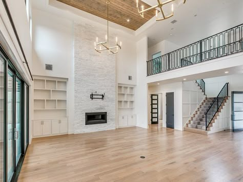 Catwalk Living Room, Two Story High Ceilings, Vaulted Ceiling Living Room With Stairs, Family Room With Staircase, Second Story Catwalk, Open Two Story Living Room, Stairs Overlooking Living Room, Great Room Staircase, Second Story Living Room