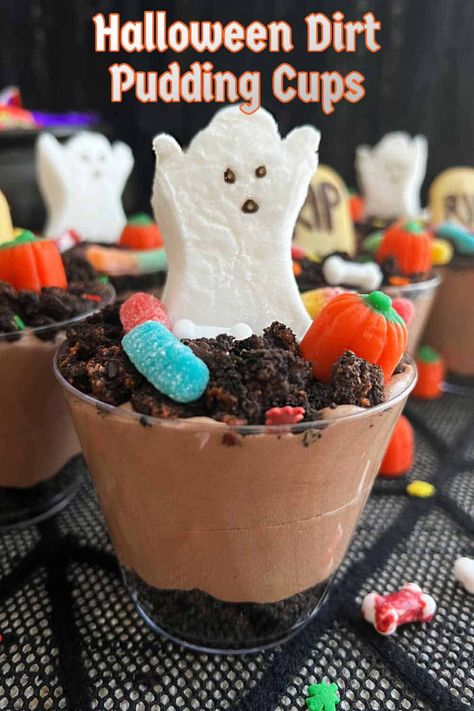 Halloween dirt cups are an easy dessert made with layers of chocolate pudding, crushed Oreos and Halloween candy. These cute graveyard cups are perfect for a Halloween party and enjoyed by kids and adults alike! via @meamel Halloween Pudding Cups Kids, Christmas Dirt Pudding, Halloween Desserts Easy Simple, Halloween Side Dishes Party, Dirt Cups For Kids, Graveyard Cups, Cute Graveyard, Halloween Dirt Pudding, Halloween Dirt Cups