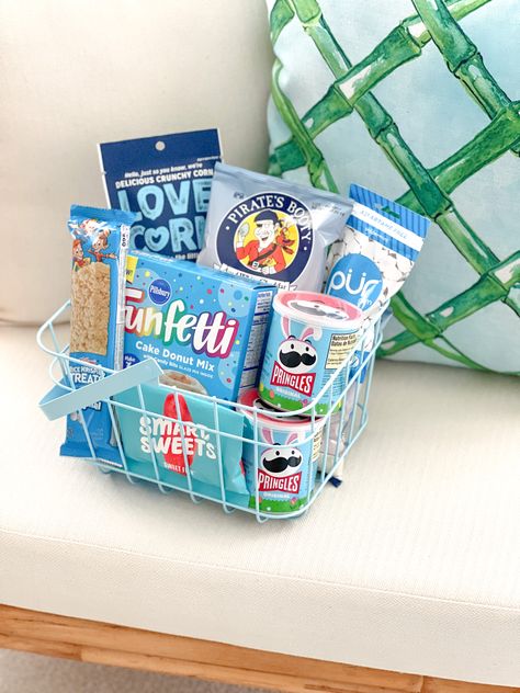 Easy Blue Easter Basket Idea ⤵️ If you’re still looking for last minute Easter Basket ideas that aren’t all candy - this aesthetically pleasing blue snack themed basket that I made for my husband came in just under $30 💙 This Easter basket would be great for a son, boyfriend, husband, teen, college student, neighbor or as a hostess gift or welcome basket for out of town guests ✨ Follow my shop @HousewifeHospitality on the @shop.LTK app to shop this post and get my exclusive app-only content! Boyfriend Easter Basket, Teen Boy Easter Basket, Cheap Easter Baskets, Blue Easter Basket, Teen Easter Basket, Blue Snacks, Adult Easter Baskets, Unique Easter Gifts, Welcome Basket